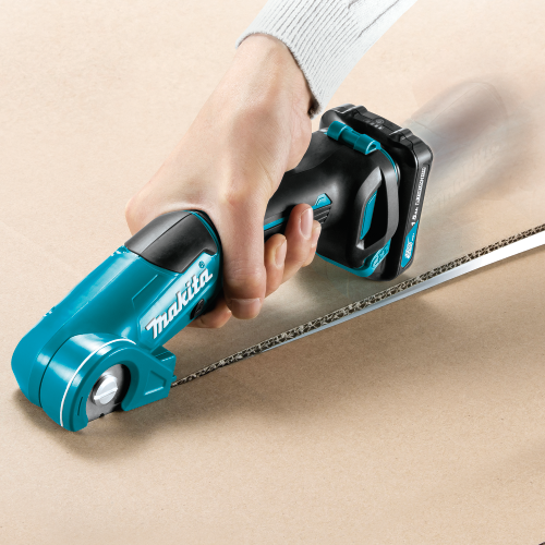 Makita PC01R3 Feature Shot (cutting cardboard) - Thumbnail